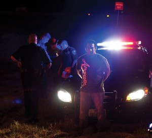 TWO ARRESTED - Two men from Woodward, Okla., were arrested following an accident in Decatur Thursday night. Above, David Flores, 22, was arrested for public intoxication and was the passenger in a vehicle that was driven on the wrong side of an exit ramp from U.S. 81/287 to U.S. 380. Messenger photo by Joe Duty