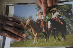 NEXT GENERATION - Father and son were featured together in a photography book on Texas cowboys. Messenger photo by Joe Duty