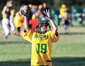 A BOY'S DREAM - Dalton Westray catches a pass during a recent football practice. The Boyd fourth grader, who was born Sept. 11, 2001, shines on the football field, as well as in the classroom. He has goals of playing football in college and studying medicine at the University of Texas.  Messenger photo by Joe Duty