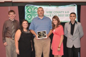 LEADER OF THE YEAR - John Moore, 4-H Leader of the Year, led the Food Challenge team to a win at State Roundup this summer. Team members include, (from left) Logan Moore, Bailey Morris, Sheryl Jennings and Christian Cross. Not pictured is Jodie Wells.