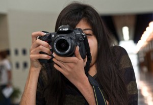FOCUSED LEADER - Decatur senior Lupe Perez serves many leadership positions, including student council president and senior photo editor of the yearbook. Born with scoliosis, Perez has faced challenges but managed to keep a positive outlook throughout them. Messenger photo by Joe Duty