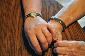 HANDFUL OF SUPPORT - With the help of her family, including daughter Tammie Avara of Bowie (hand on left), Alice Beasley has survived and continues to thrive after two cardiac arrests. She has another daughter, Pam Foti of Shawnee, Okla., and son Rodney McGee of Bowie. Messenger photo by Erika Pedroza