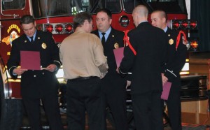 LIFESAVERS - Decatur firemen Eli Nobles (far left), Brandon Peyton (center) and Jed Boyd (far right) received the Lifesaver Award for their part in the successful rescue of heart attack victim John Conrad of Bridgeport last September. Conrad (second from left) and firefighter Brandon McGar (second from right) made the presentation. Decatur policeman Robert Cain (not pictured), who was the initial first responder, also earned the award. Photo courtesy of Rick Wallace/On-Fire Photography by Rick