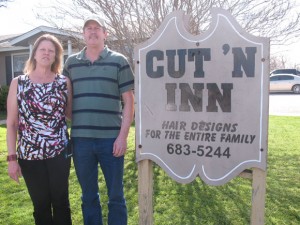 OPEN FOR BUSINESS - The Bridgeport Chamber of Commerce held a ribbon cutting for Cut-N-Inn on Feb. 23. At the celebration were business owners Kaye and Barry Wood.