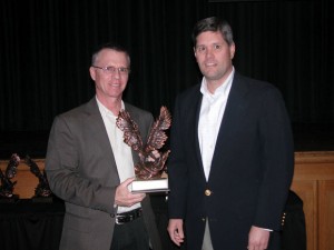 QUALITY PRODUCTS - Jim Darnell of Landmark Fabrication receives the award for quality products from EDC President Andrew Sandford.