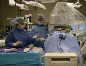 TEXAS' FIRST - Dr. Chad Stephens prepares to burn a nerve in the hip-pelvis joint of a patient in January. Stephens was the first doctor in Texas to use the latest equipment to perform a multiple cooled radiofrequency ablation of the sacroiliac joint.