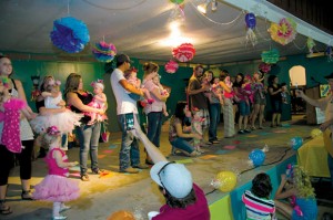 ALL DRESSED UP - Participants in the Little Mr. and Miss Pageant, along with their parents, take the Reunion Pavilion stage Monday. Messenger photo by Joe Duty