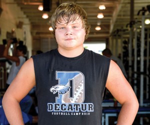 BACK ON TWO FEET — Ten months after a knee injury and blood clot nearly cost him his right leg, Tyler Story is trying to get back on the football field. Messenger photo by Joe Duty