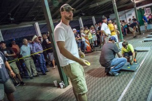 GOING FOR GOLD - One-hundred-fifty contestants took part in the third annual washer tournament Tuesday night at Wise County Old Settlers Reunion. The first place team went to newcomers Tyler Hodges, former Decatur quarterback, and power lifter Alejandro Beltran. Messenger photo by Joe Duty