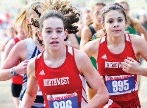 NEW CHALLENGE - Northwest's Kellee McCann and Katherine Chavez made the state cross country meet last year. They will try to make it back this year to run the new 5K for Class 5A and 4A girls. Messenger photo by Joe Duty