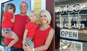 NEW LOCATION - Scout, Chris, Kai, Micah (and coming soon Baby Kit) Fernihough celebrate the new location of their business, TLC Lawnmower Sales and Repair, at 105 E. Main St. in Decatur. Messenger photo by Kelly Guess