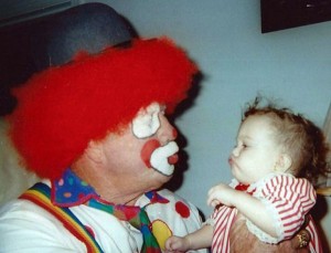 PUCKER UP - For more than 20 years, Alvin "Red" Bassham entertained young and old alike as Santa Claus and Big Red-O. A memorial account has been established to benefit children with cancer. Submitted photo