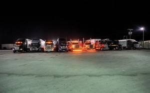 11 P.M. - The rumble of parked 18-wheelers overtakes the Golden Express Truck Stop. An area south of the store provides ample room for cross-country drivers to park and rest. Messenger photo by Joe Duty