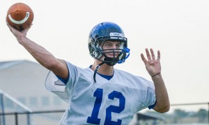 ARMED AND READY - Grayson Muehlstein, who will take over as the Decatur Eagles' starting quarterback this season, attempts a pass during practice Monday. Messenger photo by Joe Duty