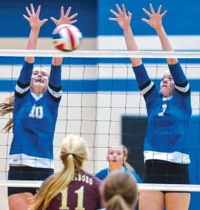 BACK AT YOU - Decatur's Cooper Martin and Darci Billmire go up for the block Tuesday against Whitesboro. Messenger photo by Joe Duty