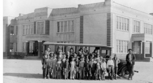 HISTORIC SAMPLE - A group of students stand in front of a bus at Decatur Public School in the 1930s. This is an example of the type of photos sought for the project at Weatherford College Wise County. Courtesy of the Wise County Historical Society