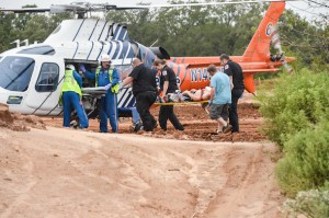 Tommy Hahn, 26, of Decatur  is carted from the track to a waiting medical helicopter. Photo by Joe Duty