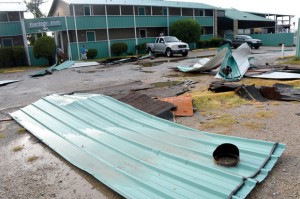 OPEN HARBOR - Wind blew the roof off Harbor Inn in Runaway Bay into an adjacent parking lot Sunday. The affected quarters were not inhabited. Messenger photo by Joe Duty