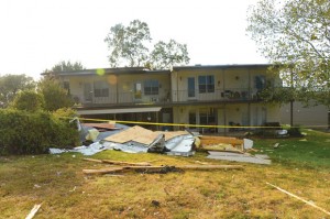 STRUCK AGAIN - Microburst winds pried the roof off of an eight-unit condominium on Runaway Bay Drive in Runaway Bay Drive. Although four families were displaced, no one was injured. Messenger photo by Joe Duty