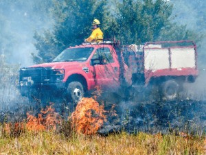 WILD FIRE - Firefighters from the U.S. Forest Service, Alvord, Chico, Lake Bridgeport, Bridgeport, Paradise, Greenwood/Slidell, Decatur, Sunset and Forestburg battled a 500-plus acre fire in the LBJ National Grasslands north of Alvord Monday. Messenger photo by Joe Duty