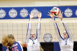 ANOTHER SWEEP - Decatur's Stormi Leonard and Darci Billmire go up for a block during the Lady Eagles win over Graham Tuesday. Messenger photo by Clay Corbett