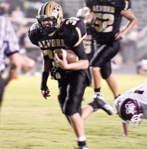 HEADING DOWNFIELD - Bulldog running back Joe Randall breaks free during one of his 13 runs in Friday night's victory over Millsap. Messenger photo by Mack Thweatt
