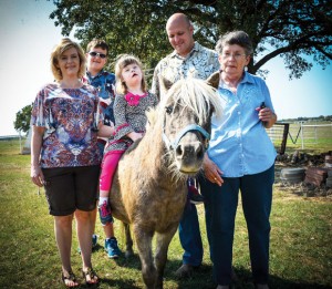 KATIE'S NETWORK - Caring for Katie Vance, 5, of Alvord, was an entire community affair, including the help of mom Brenda Vance, brother Kenson Vance IV, dad Kenson Vance III and maternal grandmother Linda Cullers. "We could not have made it if we didn't have a solid support system," Brenda said. Messenger photo by Joe Duty