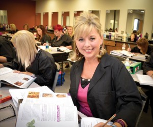 LATE START - After 28 years in the health care industry, 47-year-old Denise Latta is pursuing a passion and attending cosmetology school at Weatherford College Wise County. She was one of 24 students accepted into the inaugural class. Messenger photo by Joe Duty