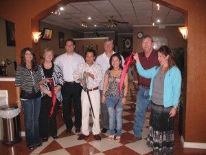 LUCKY RIBBON CUTTING - The Bridgeport Area Chamber of Commerce held a ribbon cutting for Lucky Nails Sept. 17. Pictured are owners Lisa and Lee Nguyen (center).