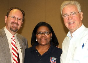 MEETING NEW PEOPLE - D.A. Sharpe (far right) visits with volunteer Justina and Dr. Lloyd A. Harsch, delegate and preacher for the Sunday worship service attended by Texas and Louisiana delegates. Harsch is a faculty member at the New Orleans Baptist Theological Seminary. Submitted photo courtesy of D.A. Sharpe