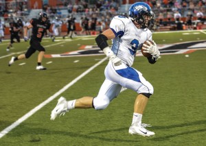 ON THE RUN - Decatur's Ben Blattner hauls in a pass during the Eagles loss to Springtown. Messenger photo by Joe Duty