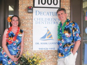 OPEN HOUSE - The Bridgeport area Chamber of Commerce held a ribbon cutting for Decatur Children's Dentistry June 6. Pictured are Dr. Mark Lantzy (night) and Keltie Lantzy.