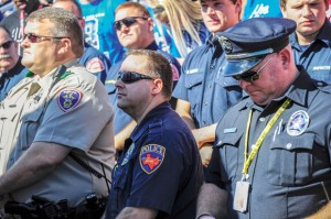 PRIDE AND REMEMBRANCE - Jeff Douglas, a Rhome police officer and school resource officer for the Northwest school district, was among several first responders honored at a ceremony Tuesday at the Texas Motor Speedway. Messenger photo by Joe Duty