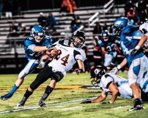 PULL DOWN - Decatur Corey Durdon brings down Burkburnett's Jason Allred. Messenger photo by Joe Duty