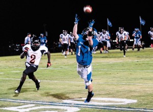 REACHING OUT - Decatur's Cain Lowe makes a leaping grab against Burkburnett. Messenger photo by Joe Duty