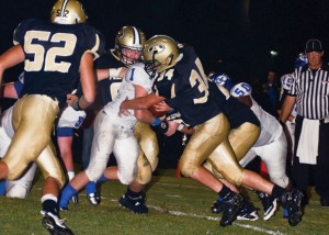TAKE DOWN - Alvord's Shane McKinney makes the tackle against Gunter Friday. Messenger photo by Mack Thweatt