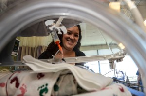 A MOTHER'S LOVE - Rachael McDaniel of Rhome rubs the back of one of her twin boys, Levi Parker. Levi and Asher, born Oct. 2, were the first twins delivered at Texas Health Harris Methodist Hospital Alliance. Messenger photo by Joe Duty