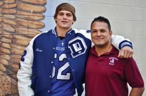 BITTER RIVALS - Mundo Hernandez of Bridgeport (right) attends every Decatur varsity football game in support of his brother-in-law Kevin Lindsey, but Hernandez can't bring himself to sit on the Decatur side during the Battle of Big Sandy. Messenger photo by Erika Pedroza