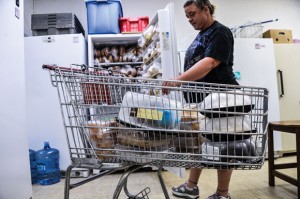 CHILL OUT - As more families fall below the poverty line, the two largest food pantries in the county are increasing capacity by adding refrigerators so they can provide more fresh fruits and vegetables to clients. Messenger photo by Joe Duty