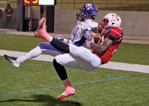 FALLING INTO PLACE - Northwest's Emmanuel Moore catches a pass from Draze Lawliss and falls backward into the Texans' endzone for a touchdown. Messenger photo by Jimmy Alford