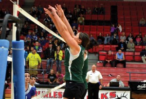 FINAL GAME - Jett Preather and Makenna Burt go up for a block against Whitney during the Lady Panther bi-district playoff game Monday. Messenger photo by Mary Wendell