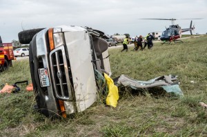FRIDAY WRECK - Lindsay Adams, 29, of Rhome was flown to John Peter Smith Hospital in Fort Worth after she flipped her truck multiple times. Her injuries were not life-threatening. Messenger photo by Joe Duty