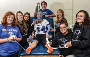 FUN AT WORK - Karley Reaves, Gabi Buchanan, Anagale Maddox, Stephanie Navarrete, Marissa Martinez, Ivie Hacker, Dakota Byrd and Anna Sherman make up the Decatur training team. (Not pictured Melissa Rogers). Messenger photo by Joe Duty