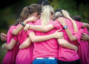 LAST WORD - The Decatur Lady Eagles huddle one last time before the start of the race. Messenger photo by Joe Duty