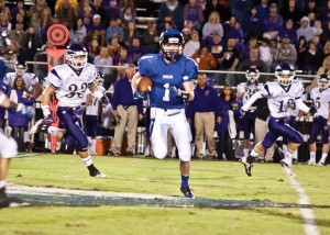 NICE CATCH - Decatur's Cain Lowe looks for running room after making a reception against Alvarado. The Eagles open district play at Gainesville Friday. Messenger photo by Jimmy Alford