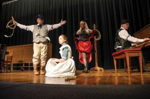 OVERCOMING CHALLENGES - Ronnie Moore of Rhome as Snake Diamond, Morgan Hoover of Newark as Chloe Clod, Dana Goodwin-Gillock of Rhome as Delores Divine and James Taylor of Decatur on the piano will star in the Wise County Historical Society's rendition of "The Shagwood Secret." The last performance is 7 p.m. Saturday at the Wise County Heritage Museum in Decatur. Messenger photo by Joe Duty