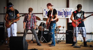 PARADISE HAS TALENT - Members of Duck Dive, Paradise High School seniors Elijah Strand, Brandon Lopez, Damian Silvas and Wesley Meadows were the opening act in the Paradise Has Talent talent show at Paradise Main Street Festival Sept. 29. They performed "Afterlife" by Avenged Sevenfold. Messenger photo by Joe Duty