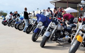 RIDING FOR A CAUSE - Entrants line up for the Justin Hunger Run Oct. 13. The event was put on by the Justin Civic Foundation to raise money for a senior center. Messenger photo by Mary Wendell