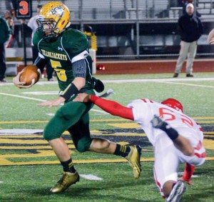 RUNNING AWAY - Boyd's Blake McDonald breaks a tackle Friday enroute to a first-quarter touchdown against Ponder. Messenger photo by Mack Thweatt