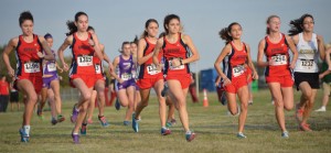 SETTING THE PACE - The Northwest Lady Texans get off to a good start  Thursday at the District 4-5A Cross Country Meet in Grapevine. Northwest finished second. Messenger photo by Joe Duty